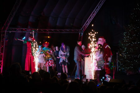 People on stage at switching on the Christmas Lights
