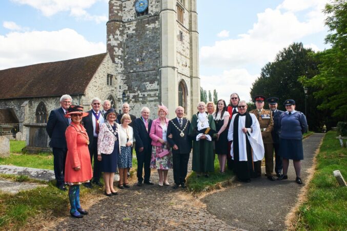 Group of people in front of a church