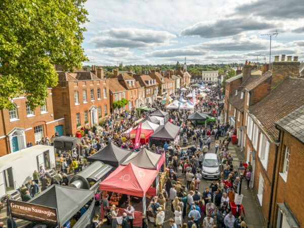 Aerial shot of street and large crowd of people