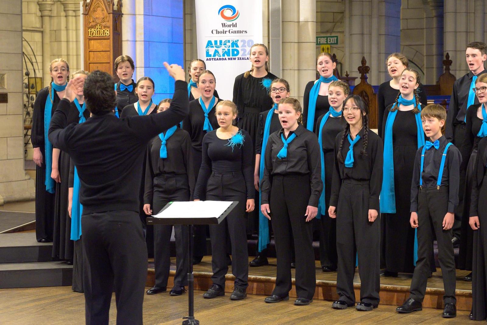 Young people singing in a choir.